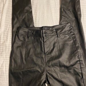 Size Medium. Looks like leather. Black pants